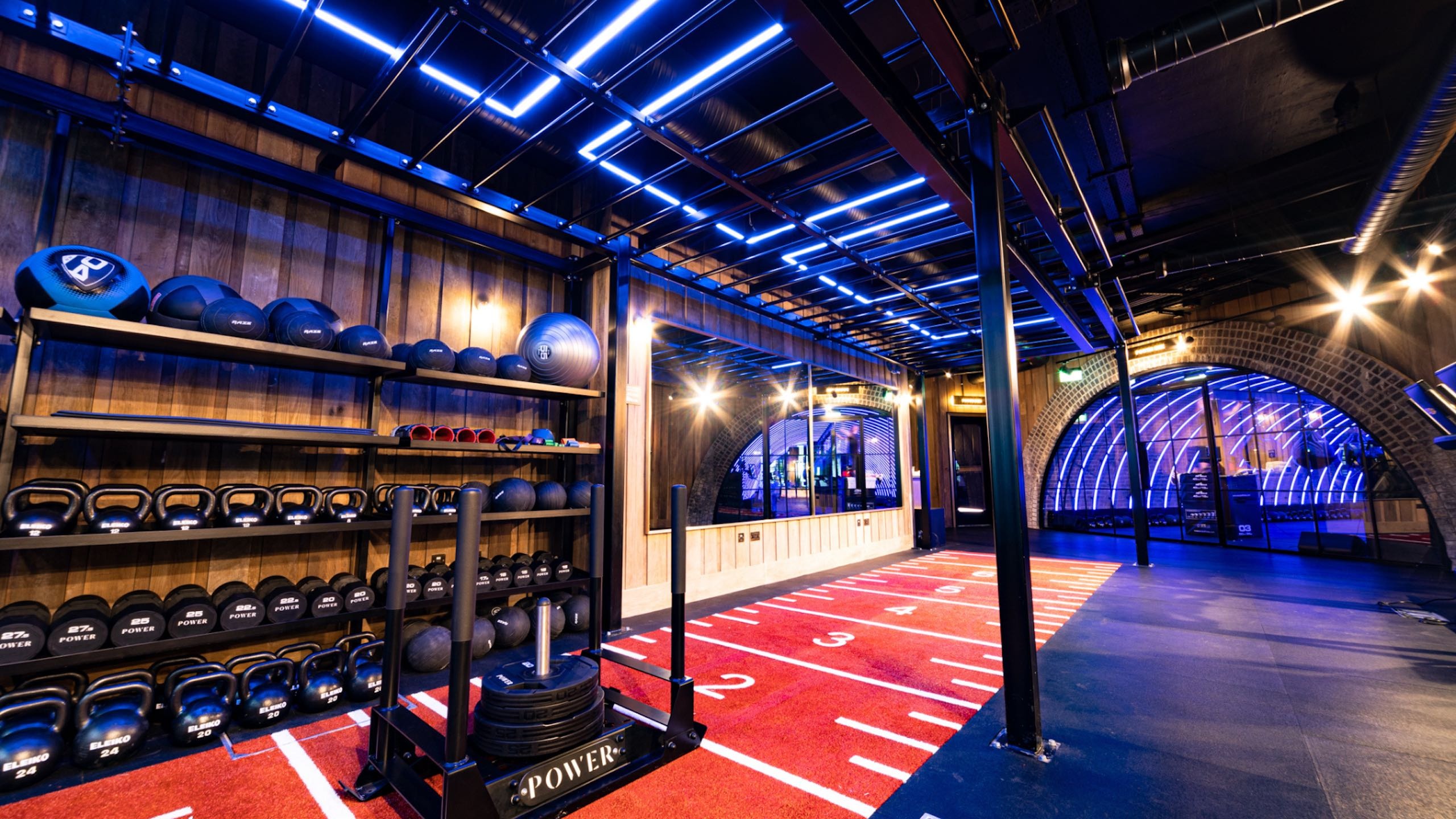 Gym with weight rack and weight sled