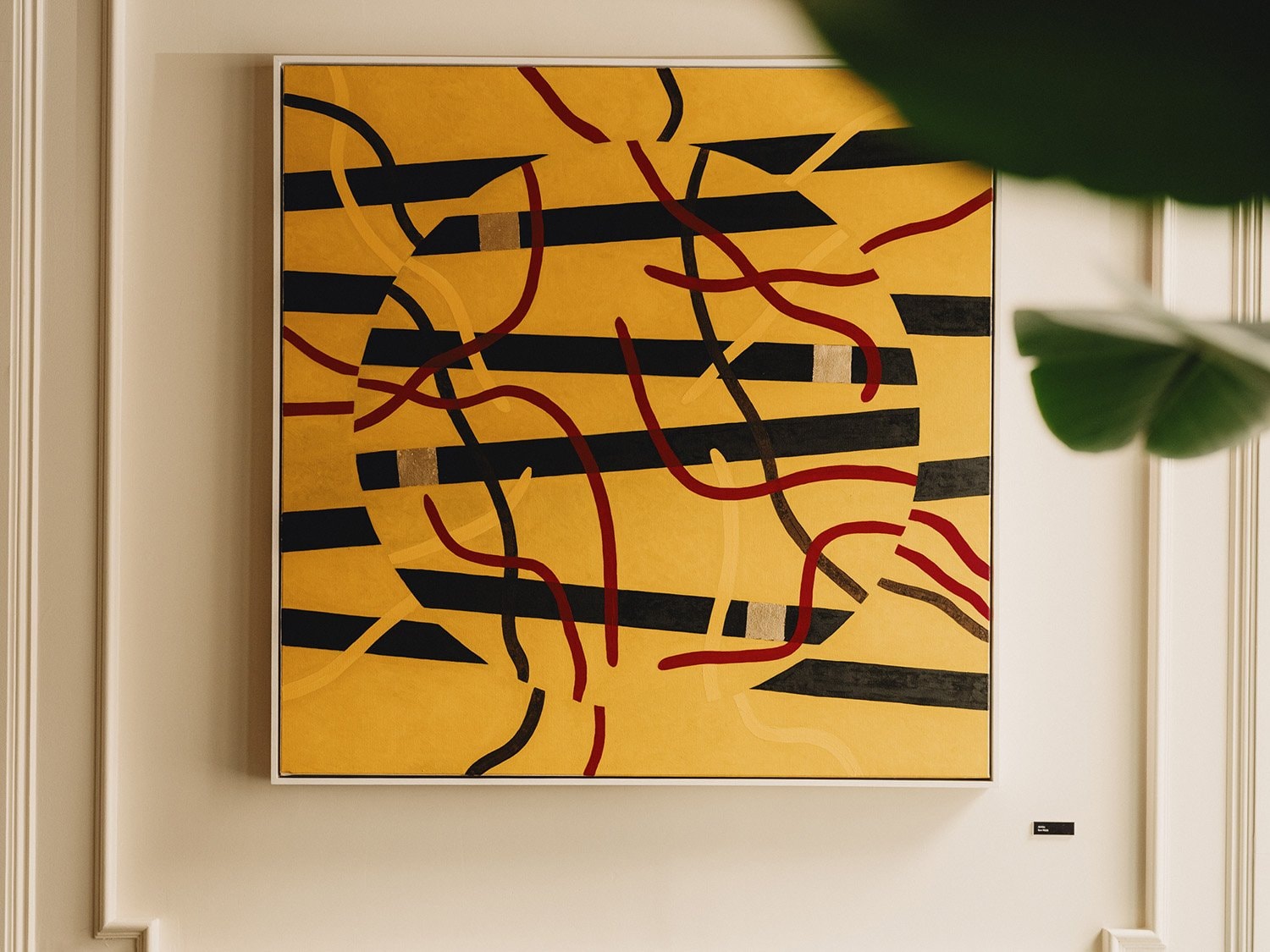 An abstract painting on a wall