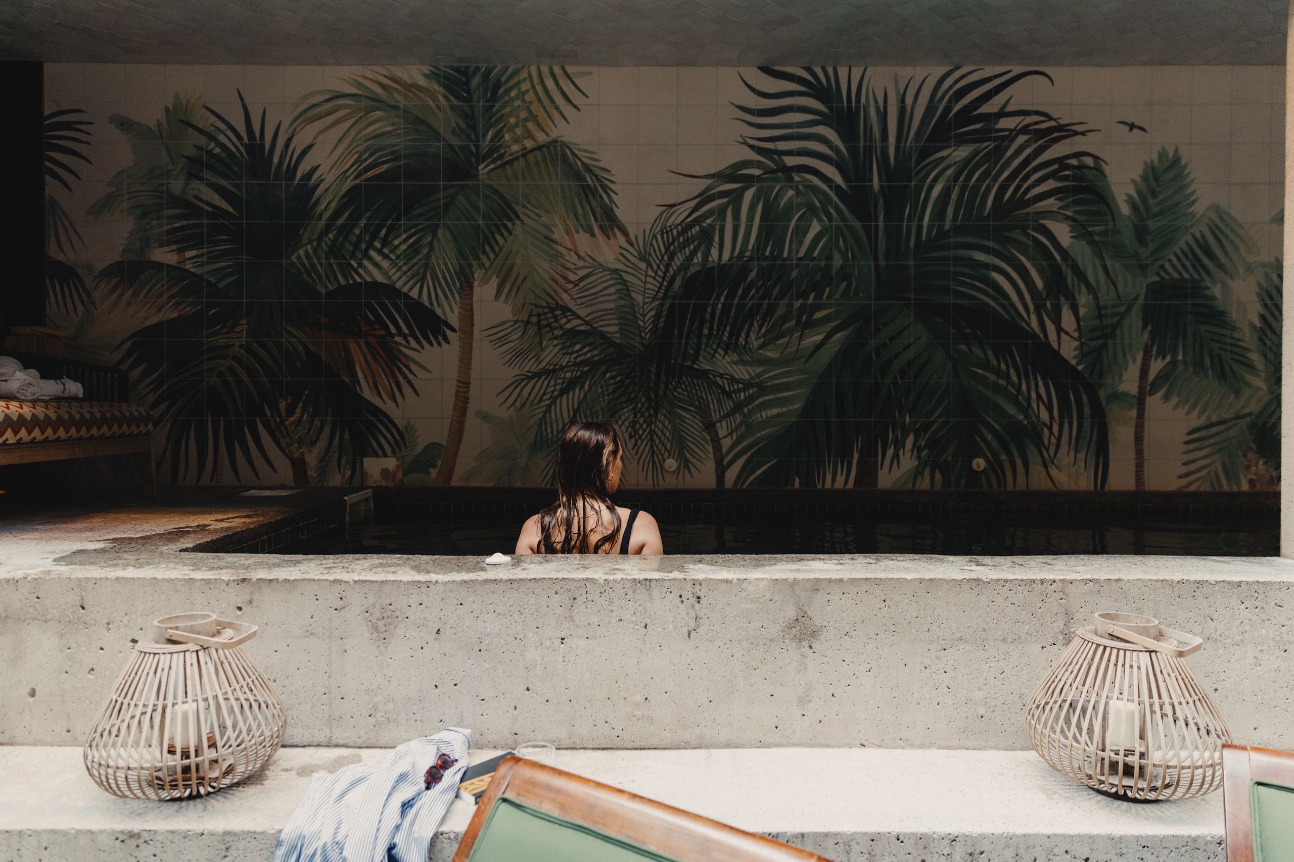 Woman sitting in a pool